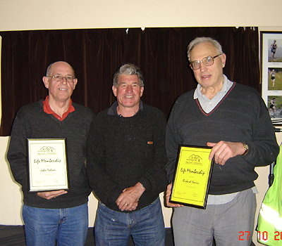 John Palmer (left) and the late Dick Harris (right) awarded Life Membership in 2010 by President Brian Watson